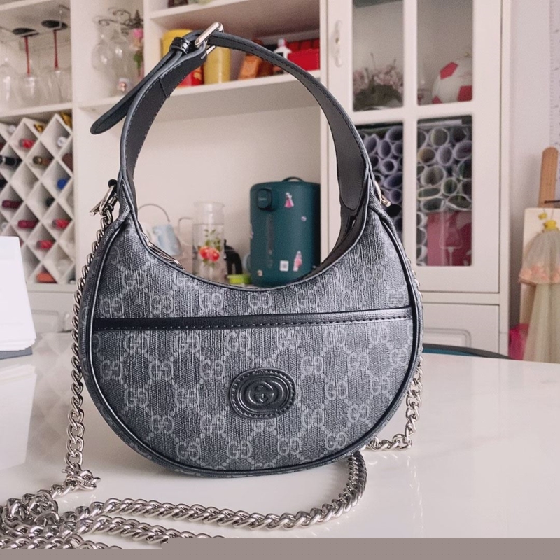G*u*i top handle bags